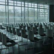 grayscale photography of chairs in room