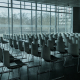 grayscale photography of chairs in room