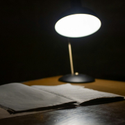 black table lamp beside book